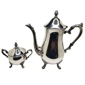 vintage pair of silver plate tea pot with sugar bowl.
